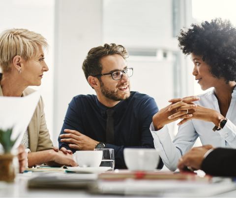 three people meeting